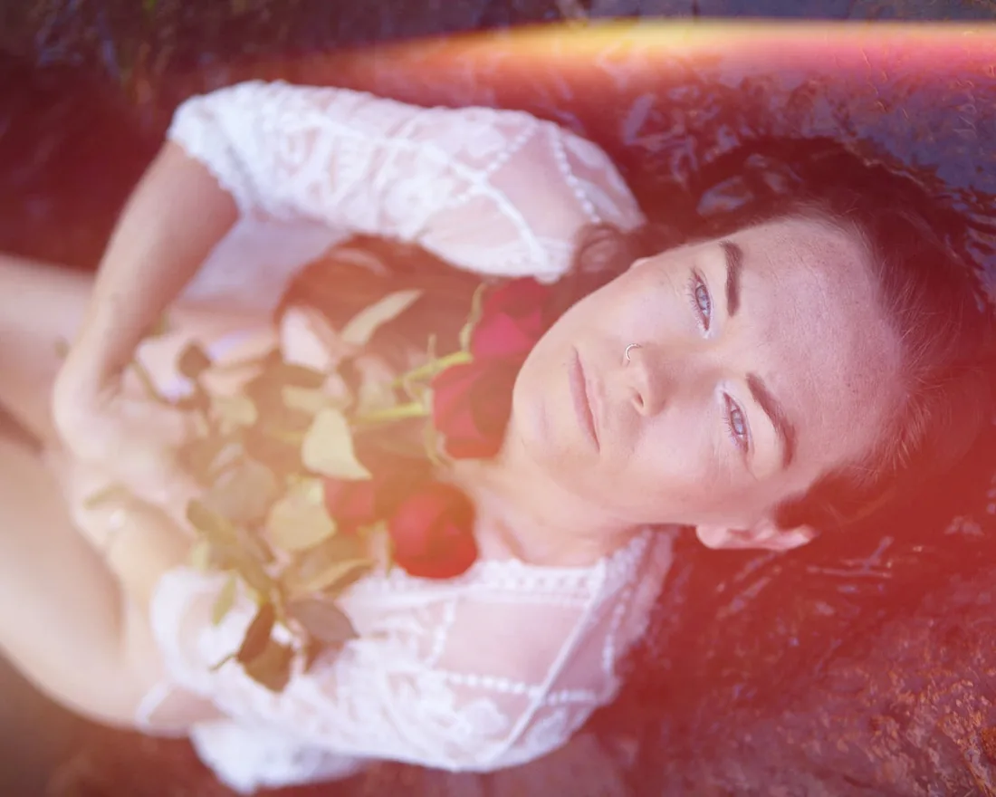 Dried rose petals — herbs and flowers used in the womb steam ritual